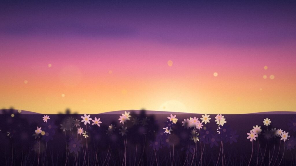 Wildflowers silhouetted against a pink and orange sunset sky